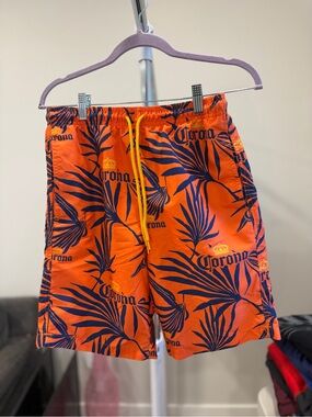 Corona Orange Swim Trunks with Navy Tropical Leaf Print